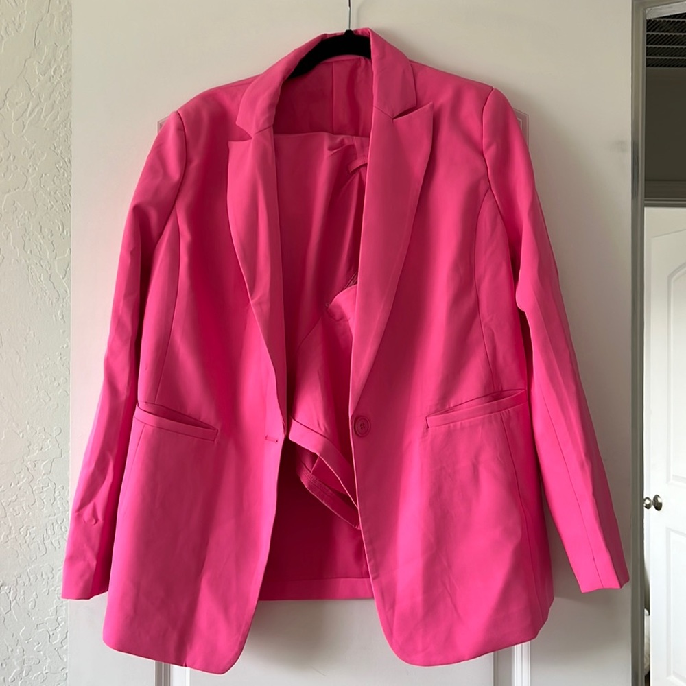 Neon pink blazer with matching shorts
